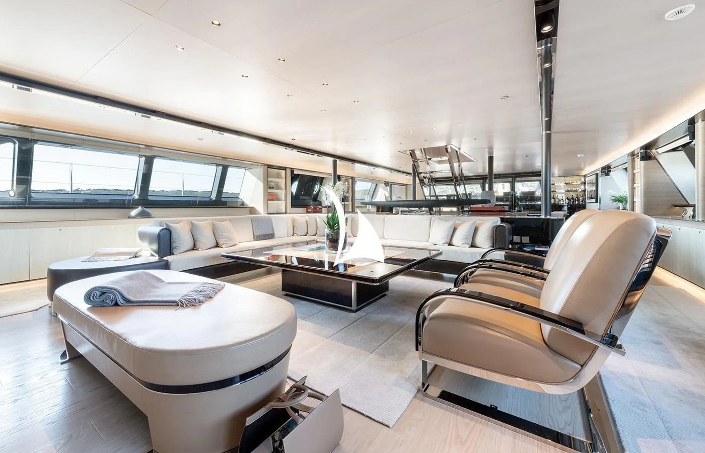 a room with a couch and a table aboard ASAHI Yacht for Sale