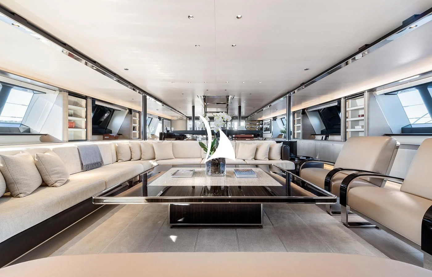 a room with a couch and a table aboard ASAHI Yacht for Sale