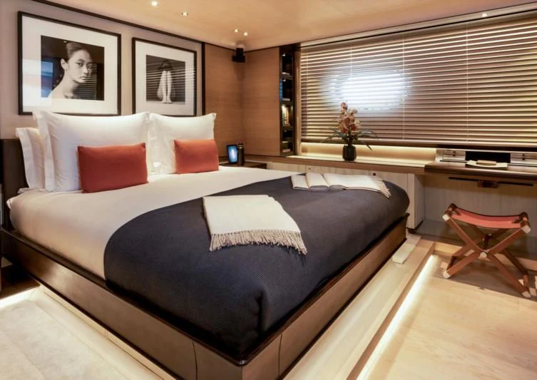 a bed with pillows aboard ASAHI Yacht for Sale