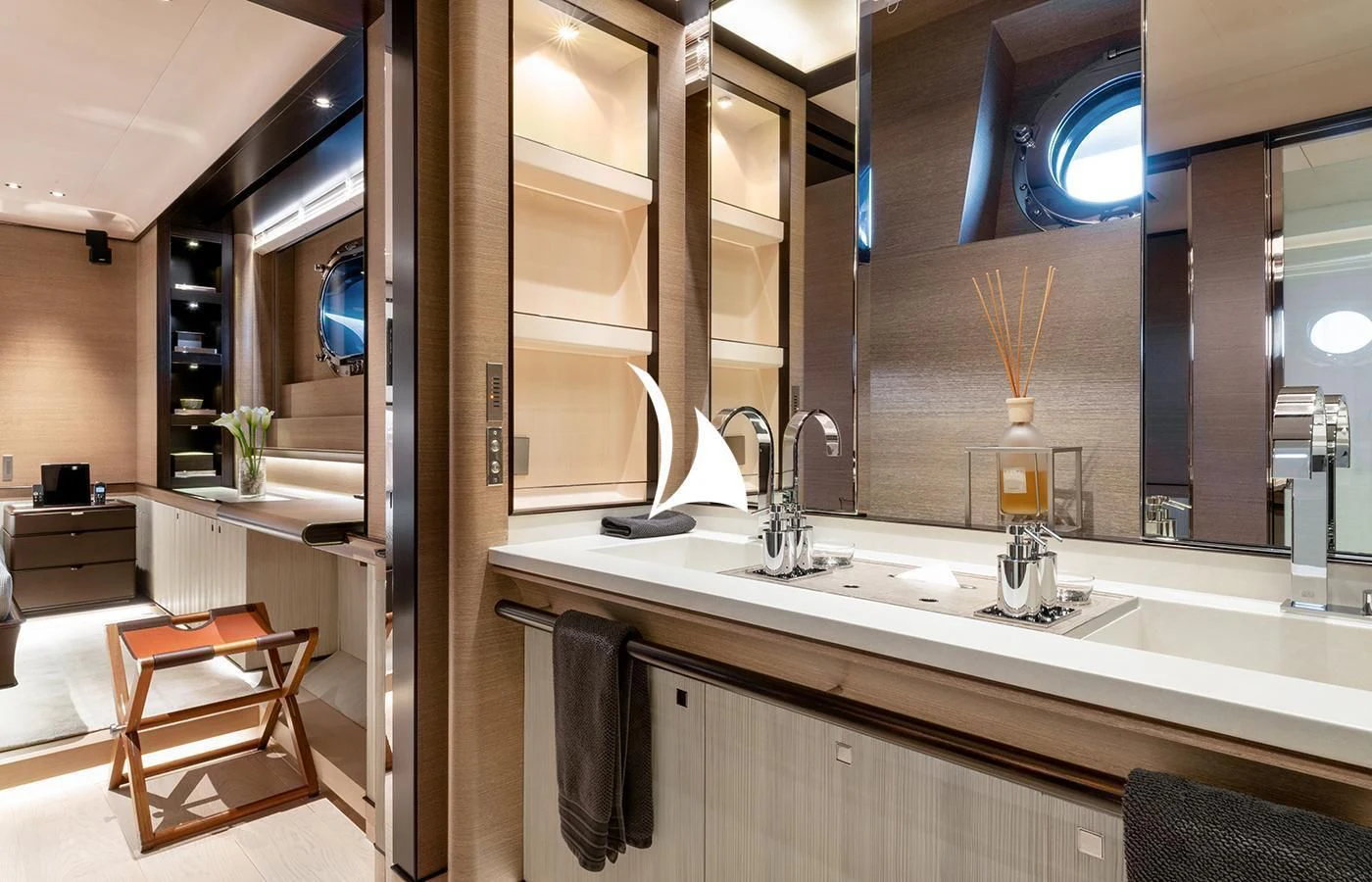 a bathroom with a sink and a mirror aboard ASAHI Yacht for Sale
