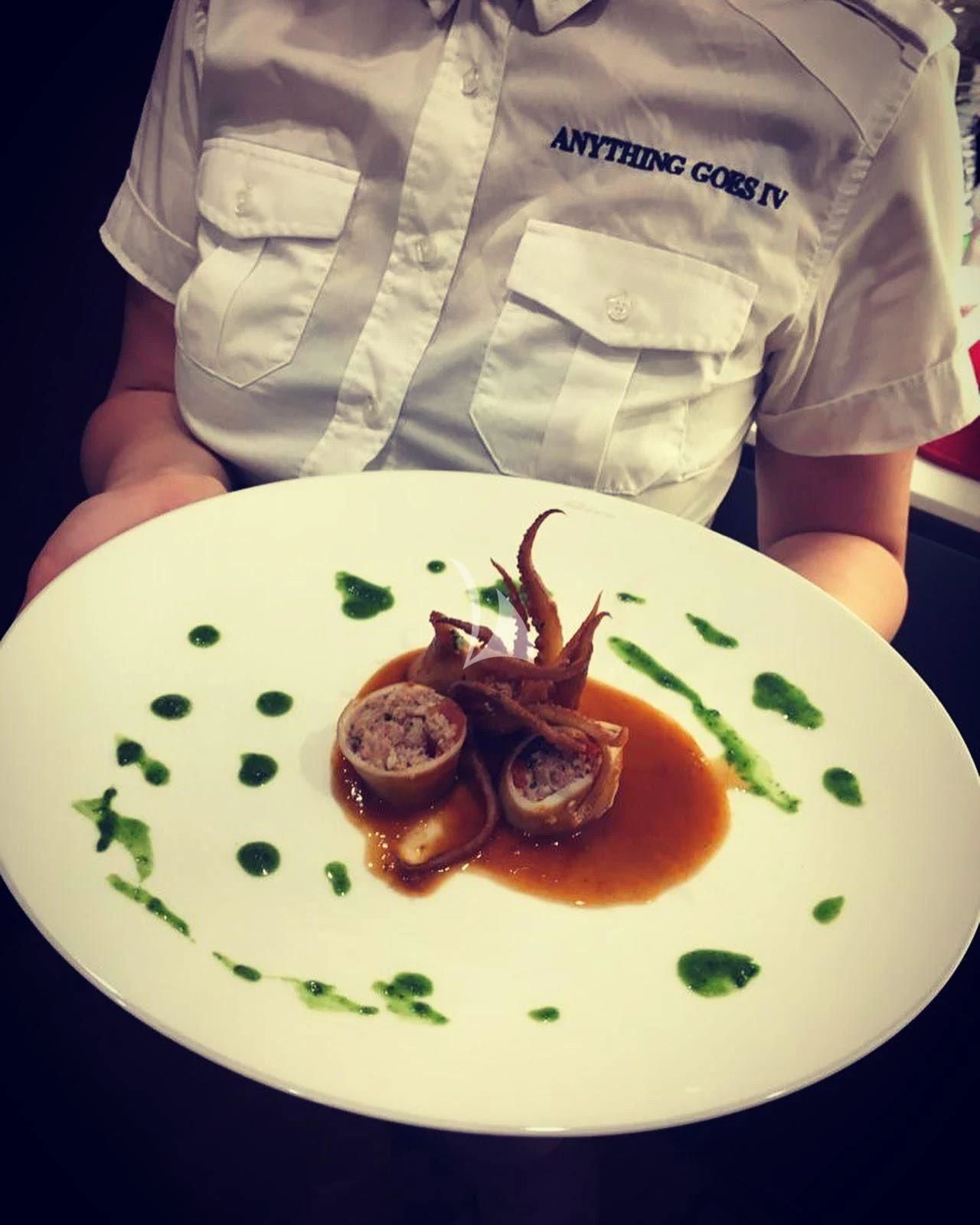 a plate of food aboard ANYTHING GOES IV Yacht for Sale