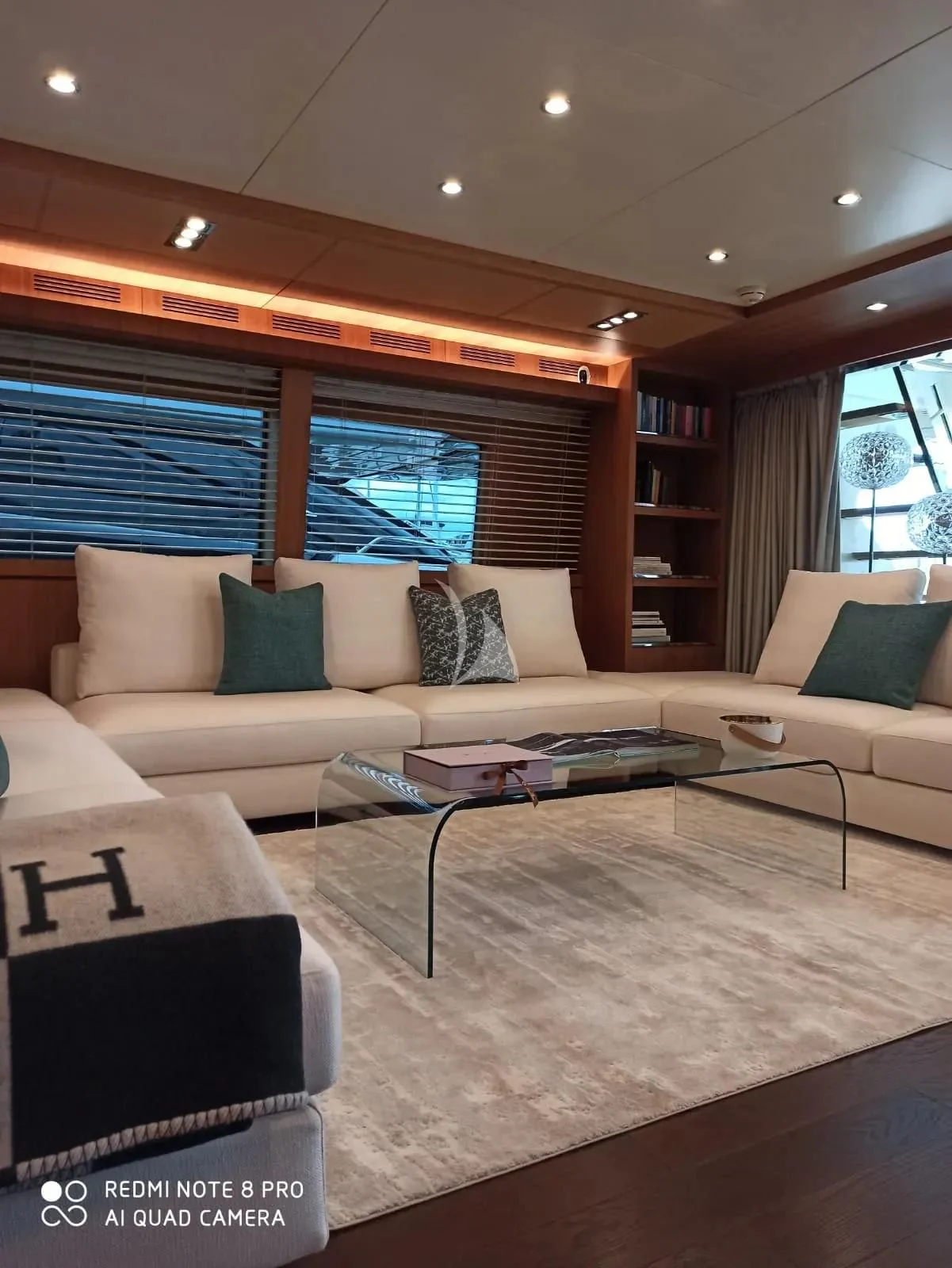 a living room with a couch and a coffee table aboard ANYTHING GOES IV Yacht for Sale