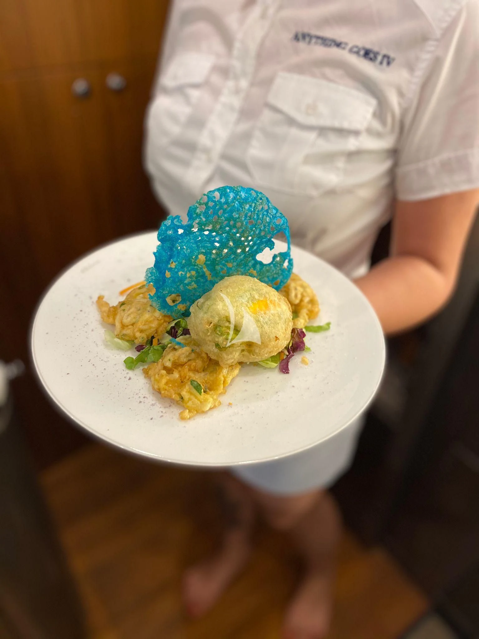 a plate of food aboard ANYTHING GOES IV Yacht for Sale