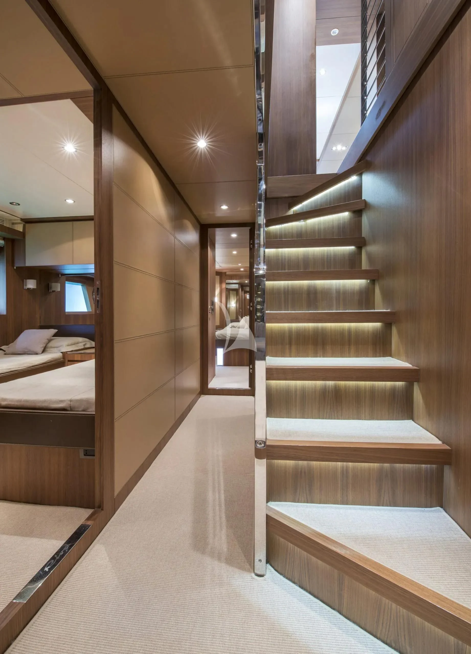 a wooden staircase in a room aboard ANYTHING GOES IV Yacht for Sale