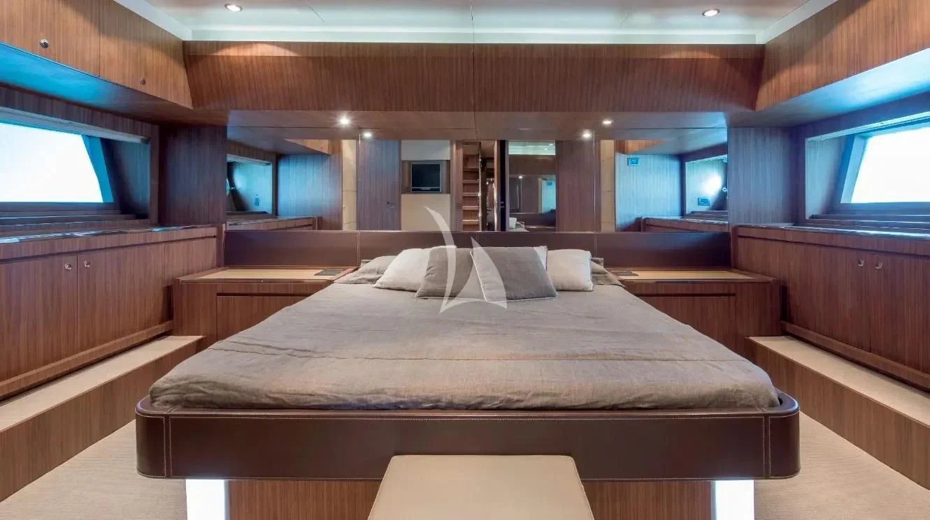 a bed in a room aboard ANYTHING GOES IV Yacht for Sale