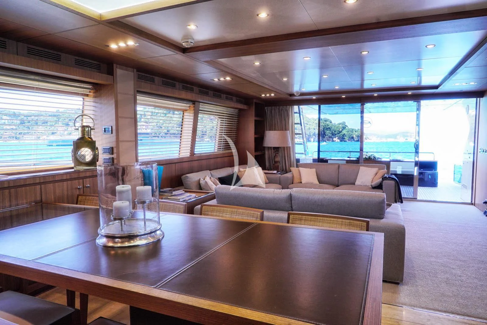 a living room with a large window aboard ANYTHING GOES IV Yacht for Sale