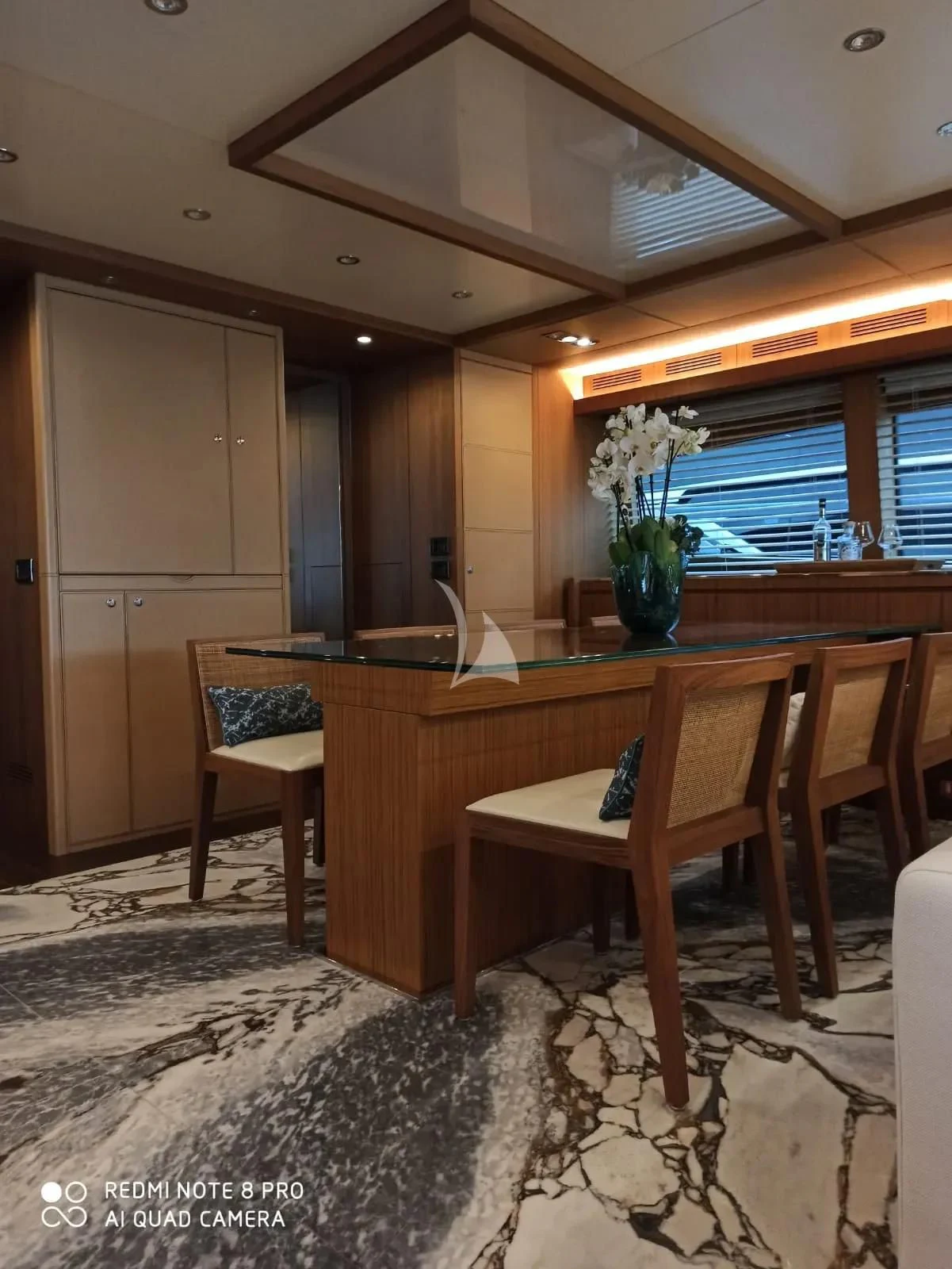 a room with a table and chairs aboard ANYTHING GOES IV Yacht for Sale
