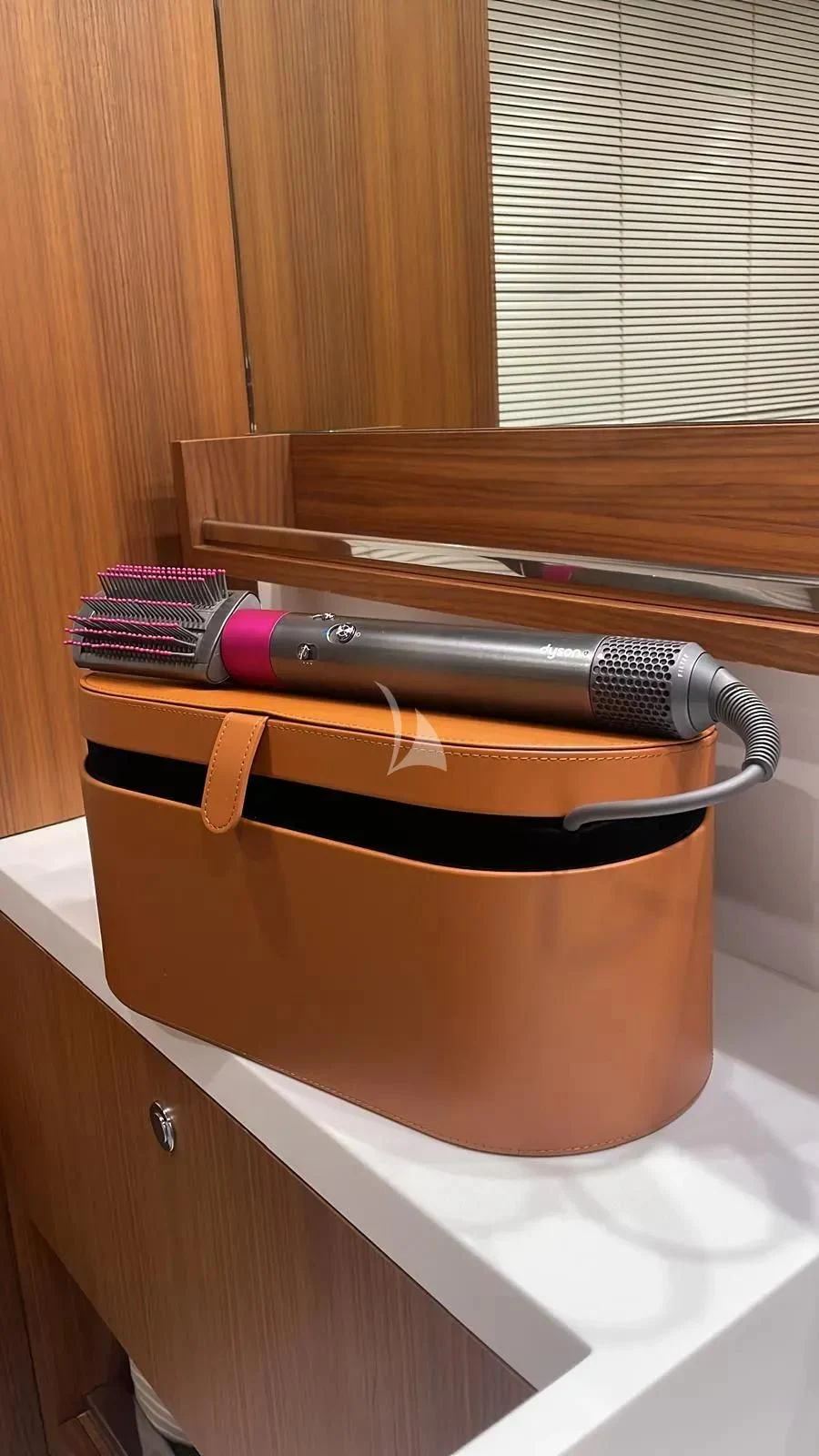 a brown leather case with a strap aboard ANYTHING GOES IV Yacht for Sale
