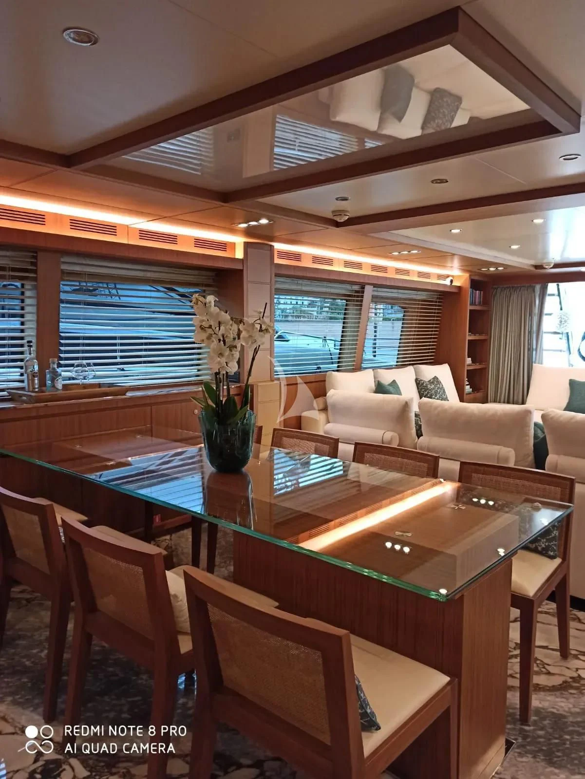 a room with a table and chairs aboard ANYTHING GOES IV Yacht for Sale