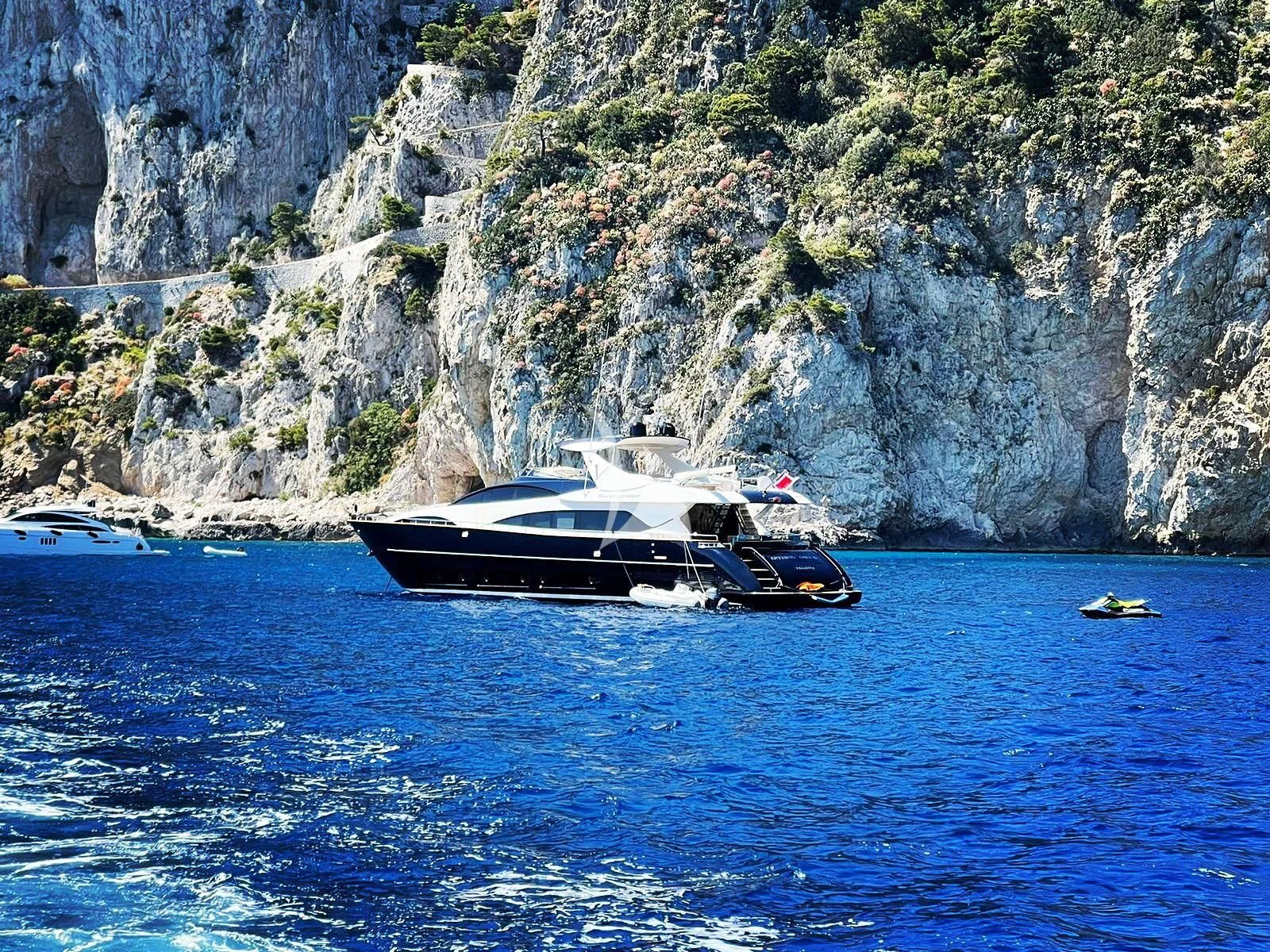 a boat on the water aboard ANYTHING GOES IV Yacht for Sale