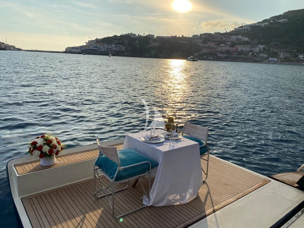 a boat on the water aboard ANYTHING GOES IV Yacht for Sale
