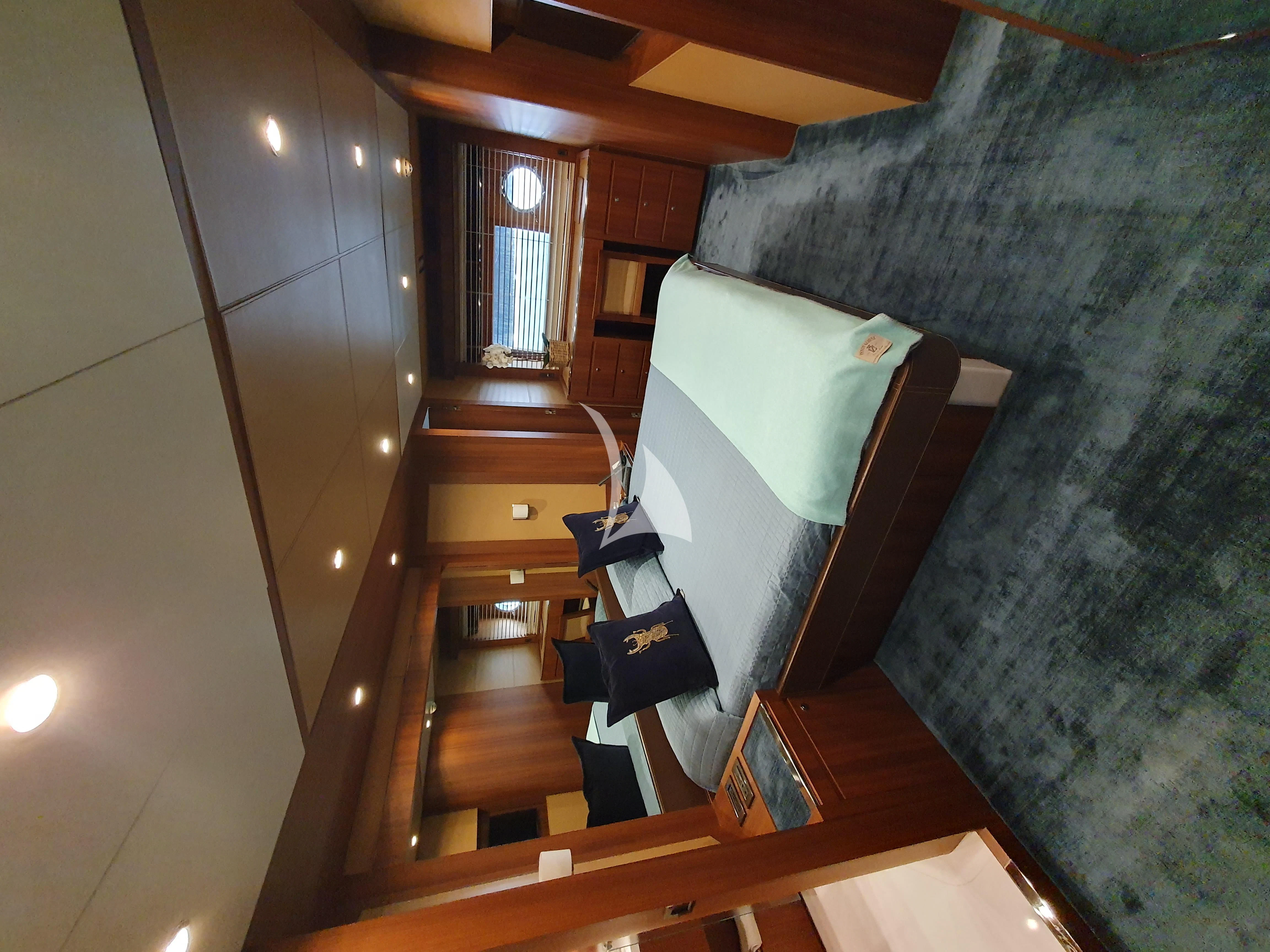 a person standing on a wooden platform aboard ANYTHING GOES IV Yacht for Sale