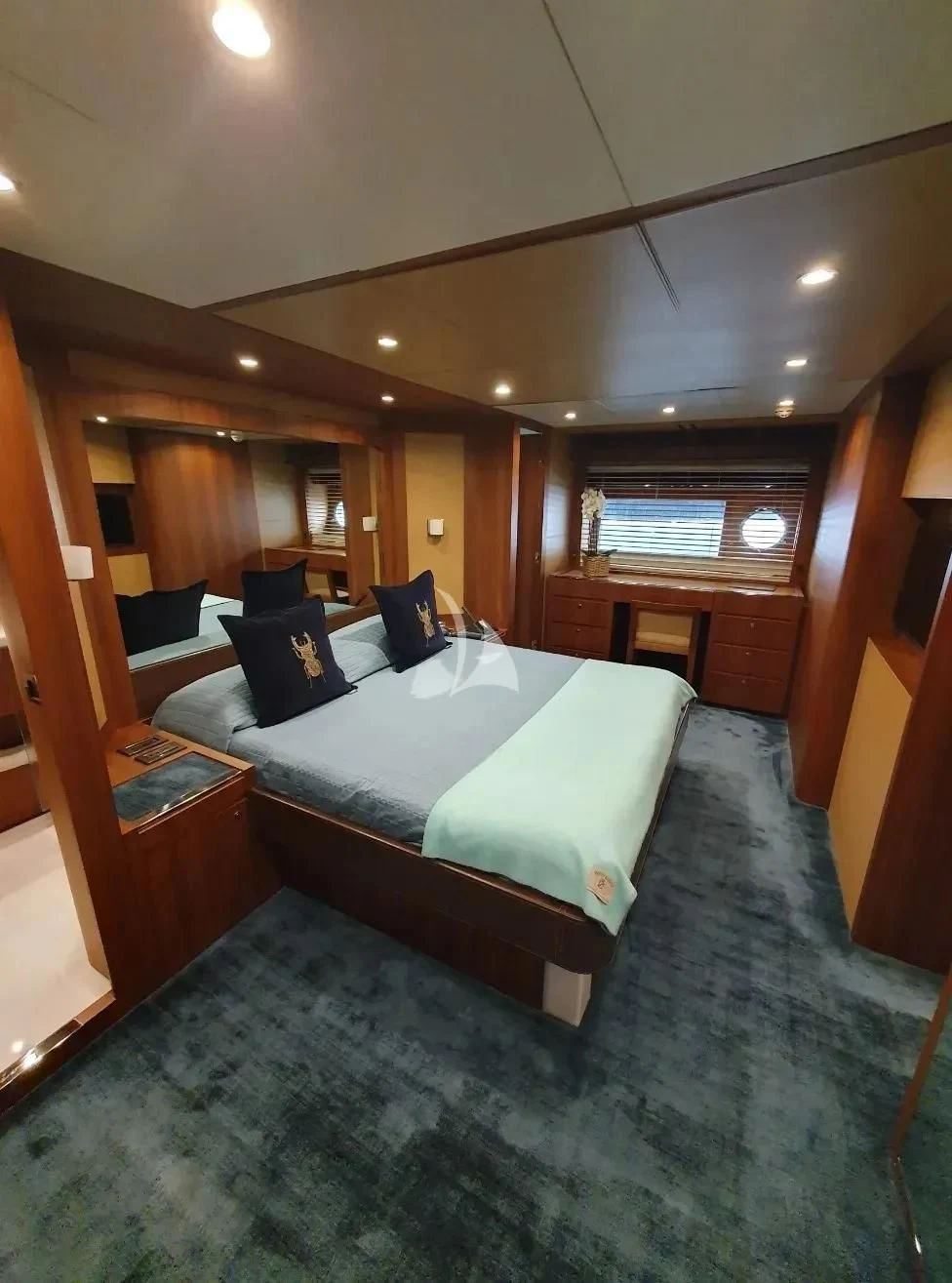 a bed in a room aboard ANYTHING GOES IV Yacht for Sale