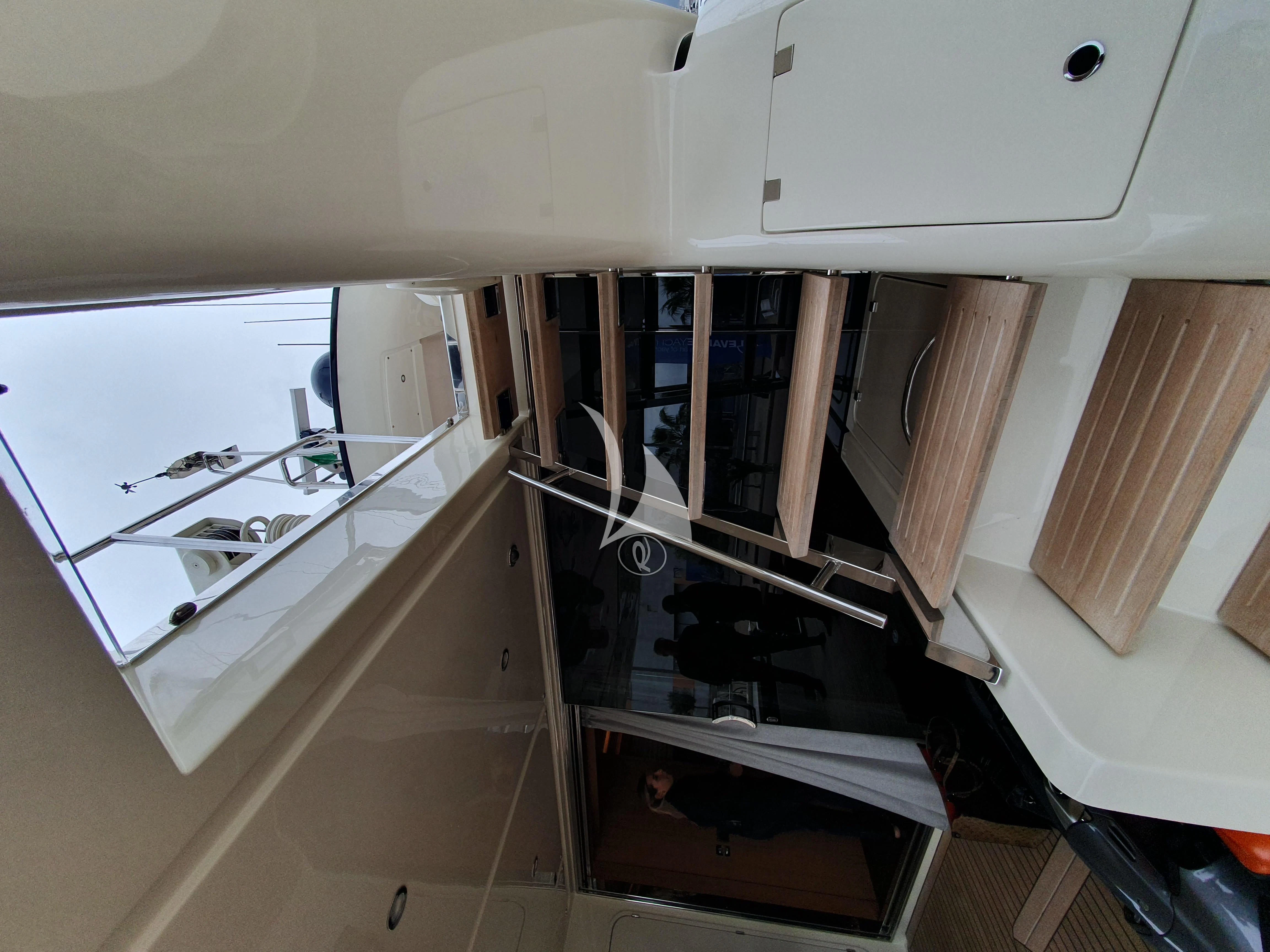 a kitchen with a sink and cabinets aboard ANYTHING GOES IV Yacht for Sale
