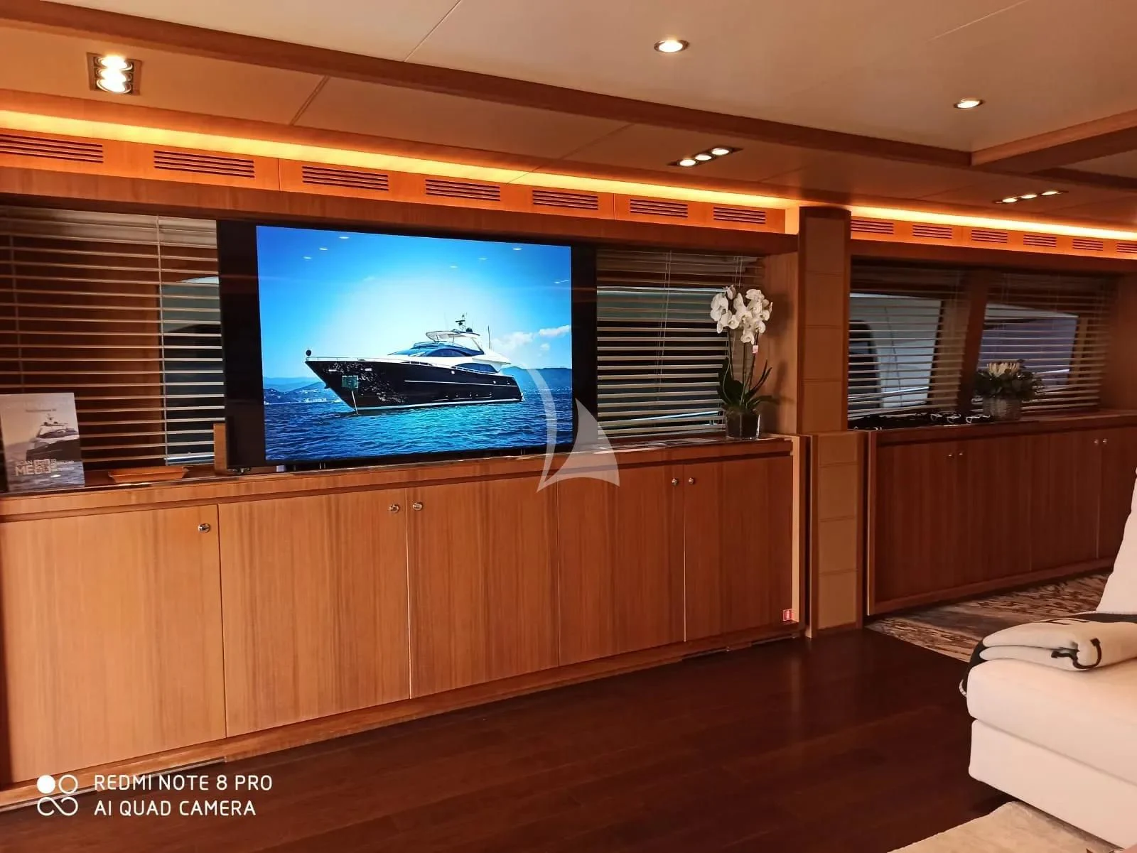 a room with a large television aboard ANYTHING GOES IV Yacht for Sale