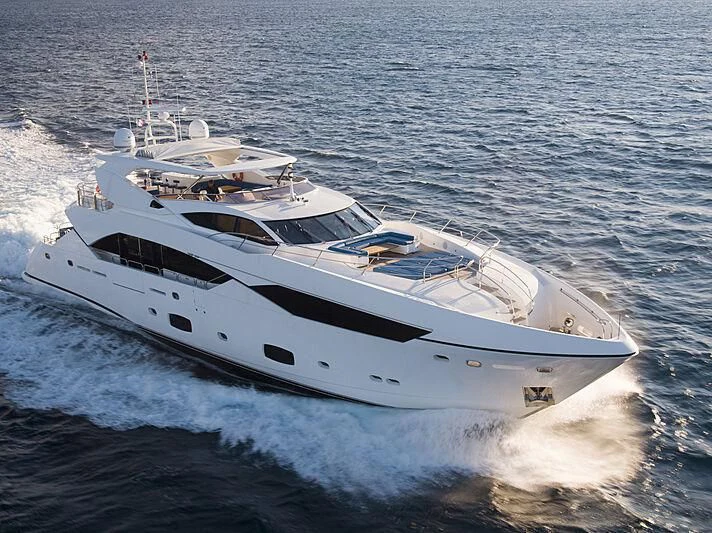 a white yacht on the water aboard R2 Yacht for Sale