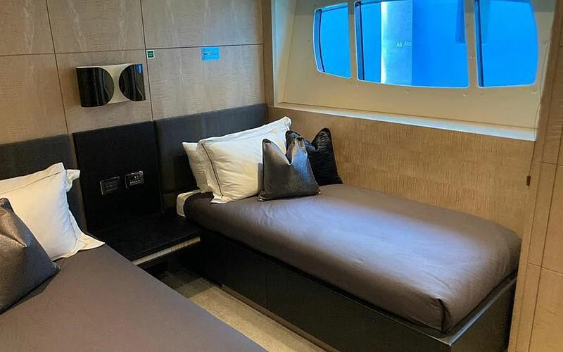 a bed in a room aboard R2 Yacht for Sale