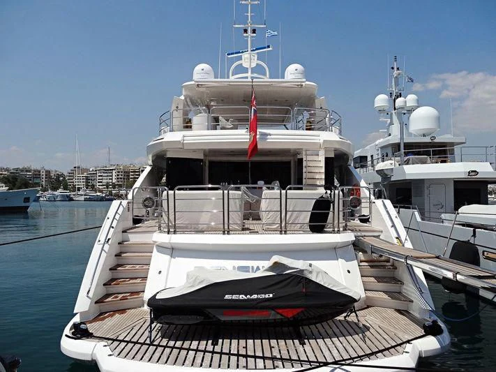 a large boat docked at a pier aboard R2 Yacht for Sale