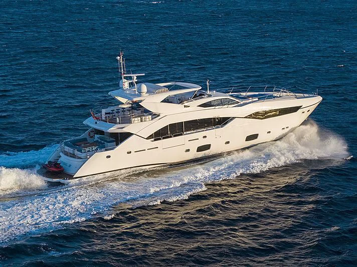 a white yacht on the water aboard R2 Yacht for Sale