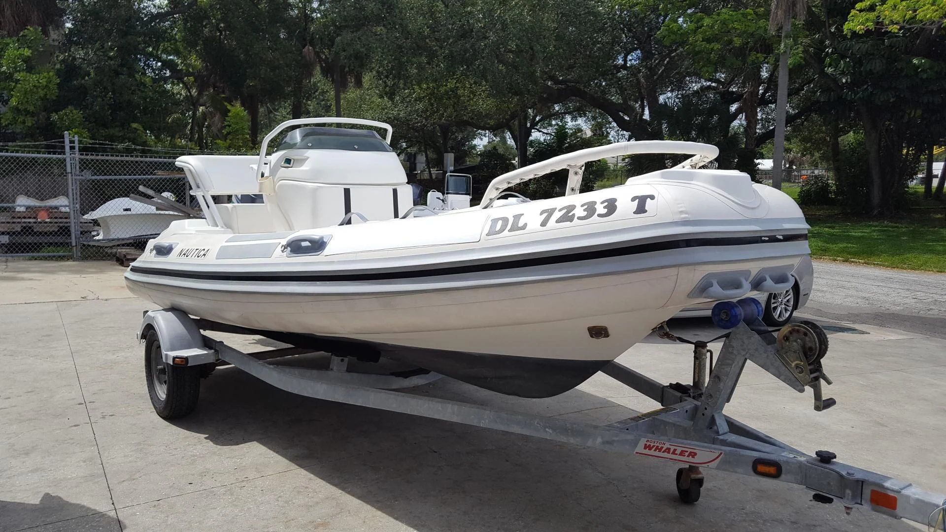 a boat on a trailer aboard PRIMETIME III Yacht for Sale