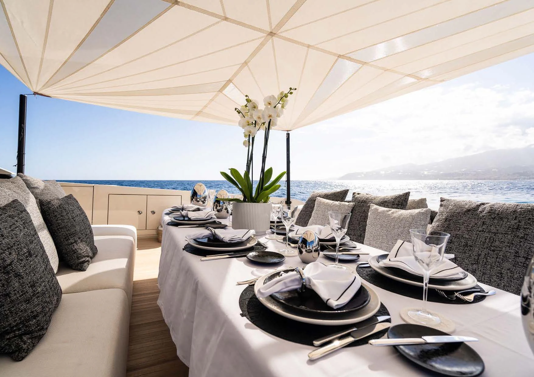 a table set for a meal aboard ANMAX Yacht for Sale