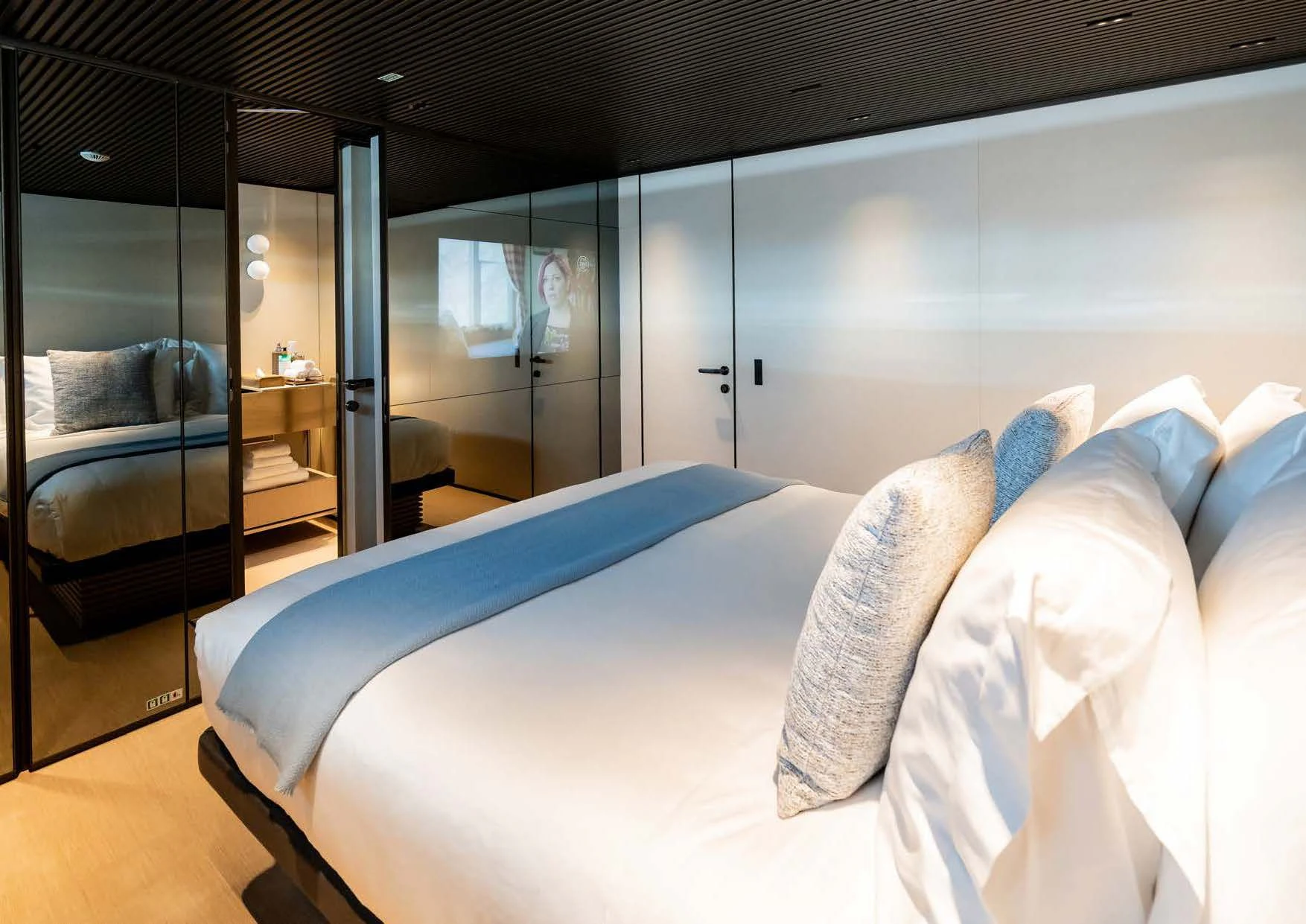 a bed in a room aboard ANMAX Yacht for Sale