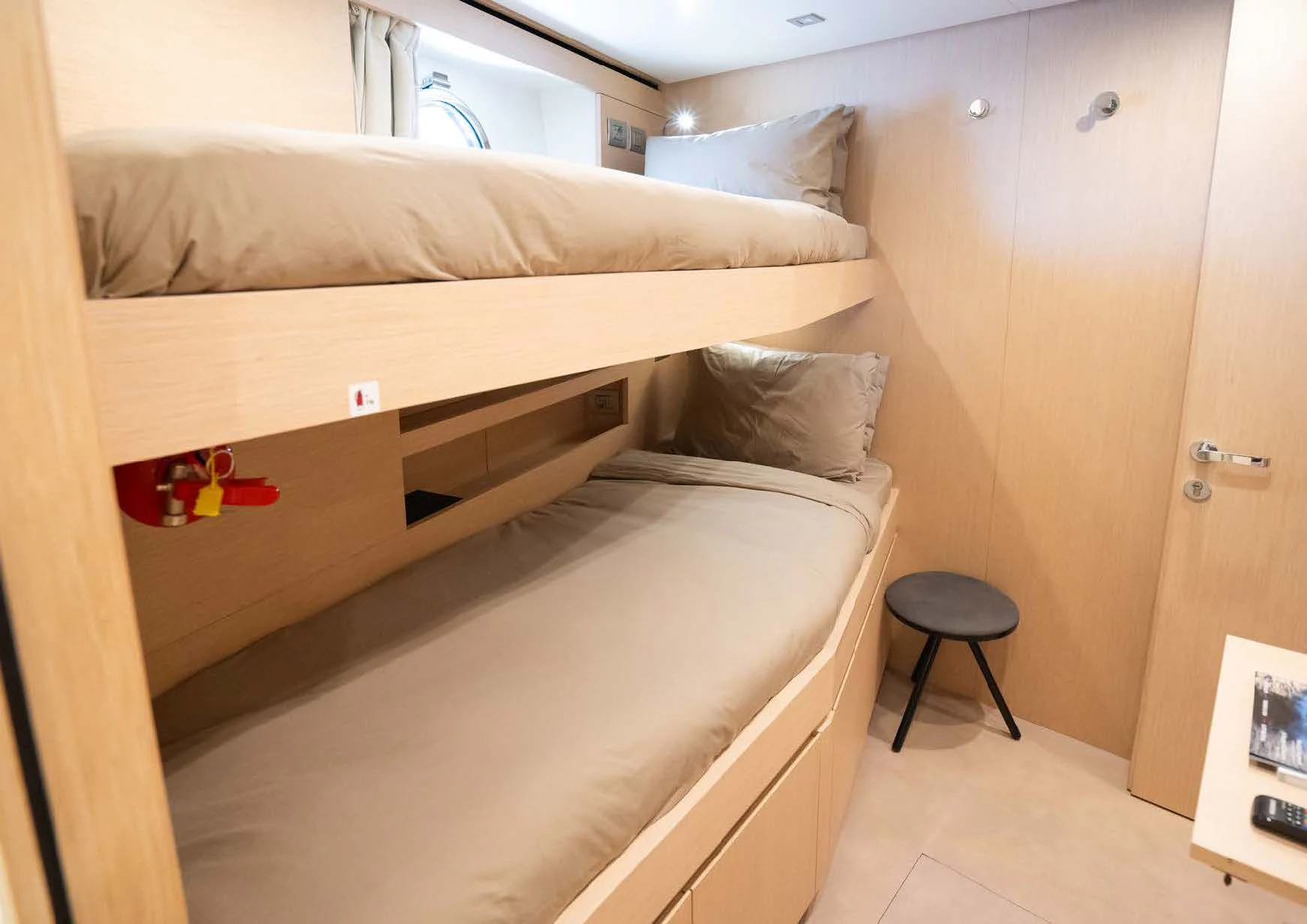 a bed with a wooden frame aboard ANMAX Yacht for Sale
