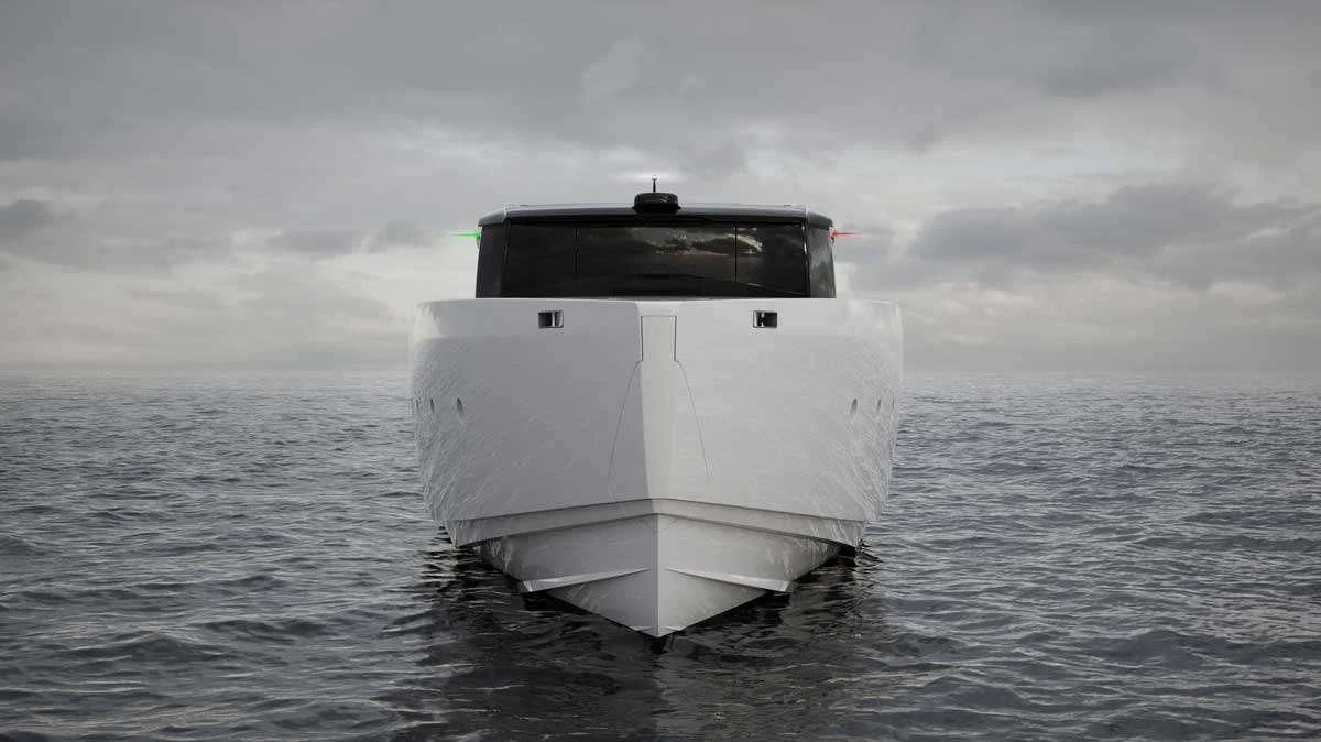 a white boat in the water aboard ANMAX Yacht for Sale
