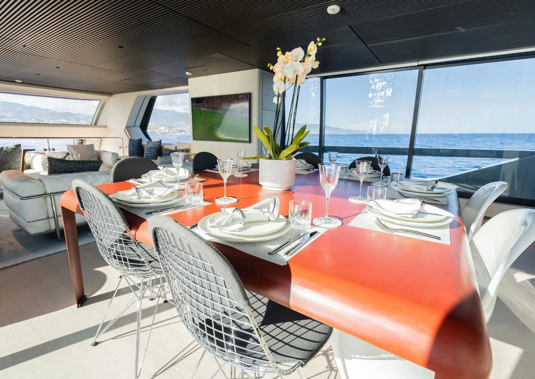 a table set with dinnerware aboard ANMAX Yacht for Sale
