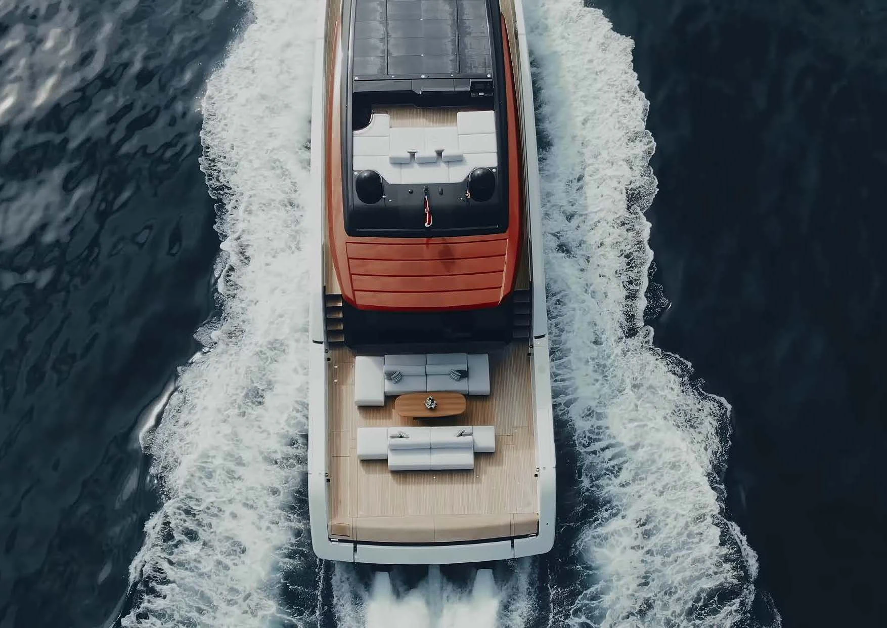 a small wooden boat in the water aboard ANMAX Yacht for Sale