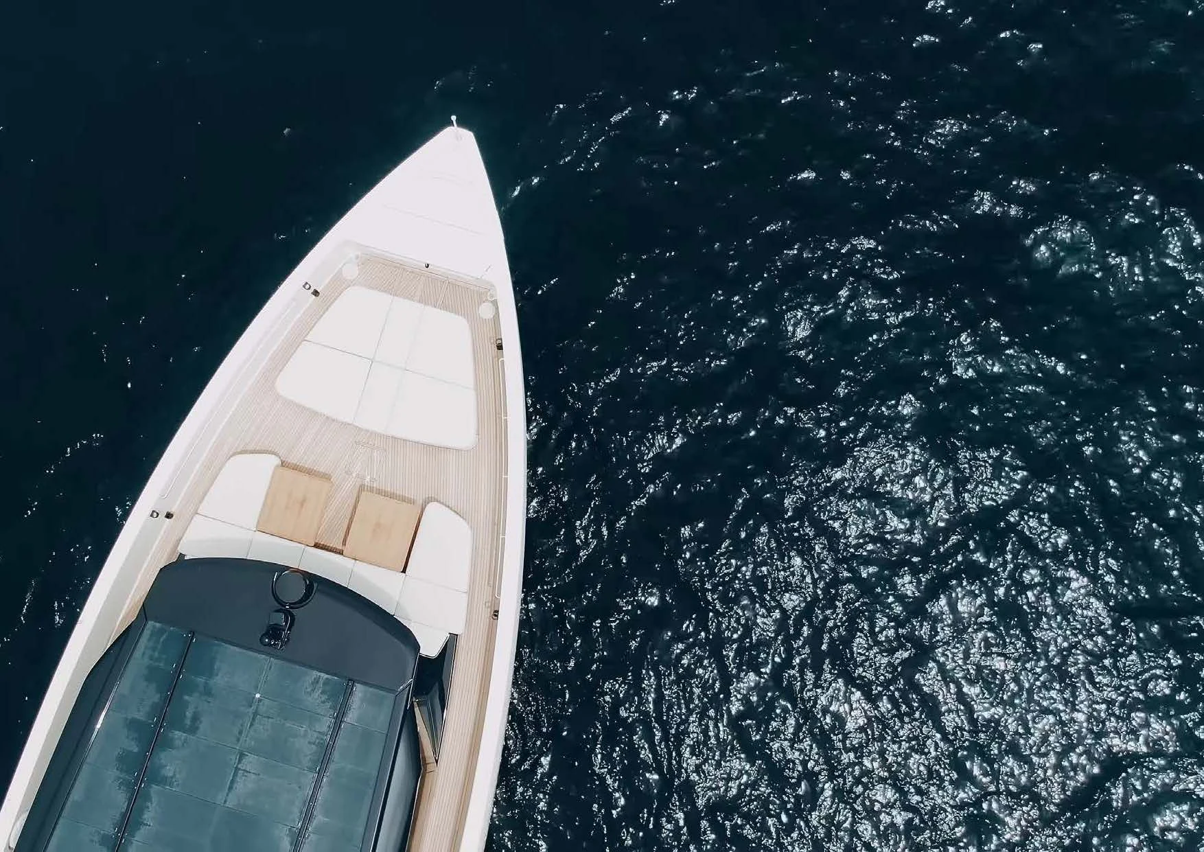 a house with a boat on the water aboard ANMAX Yacht for Sale