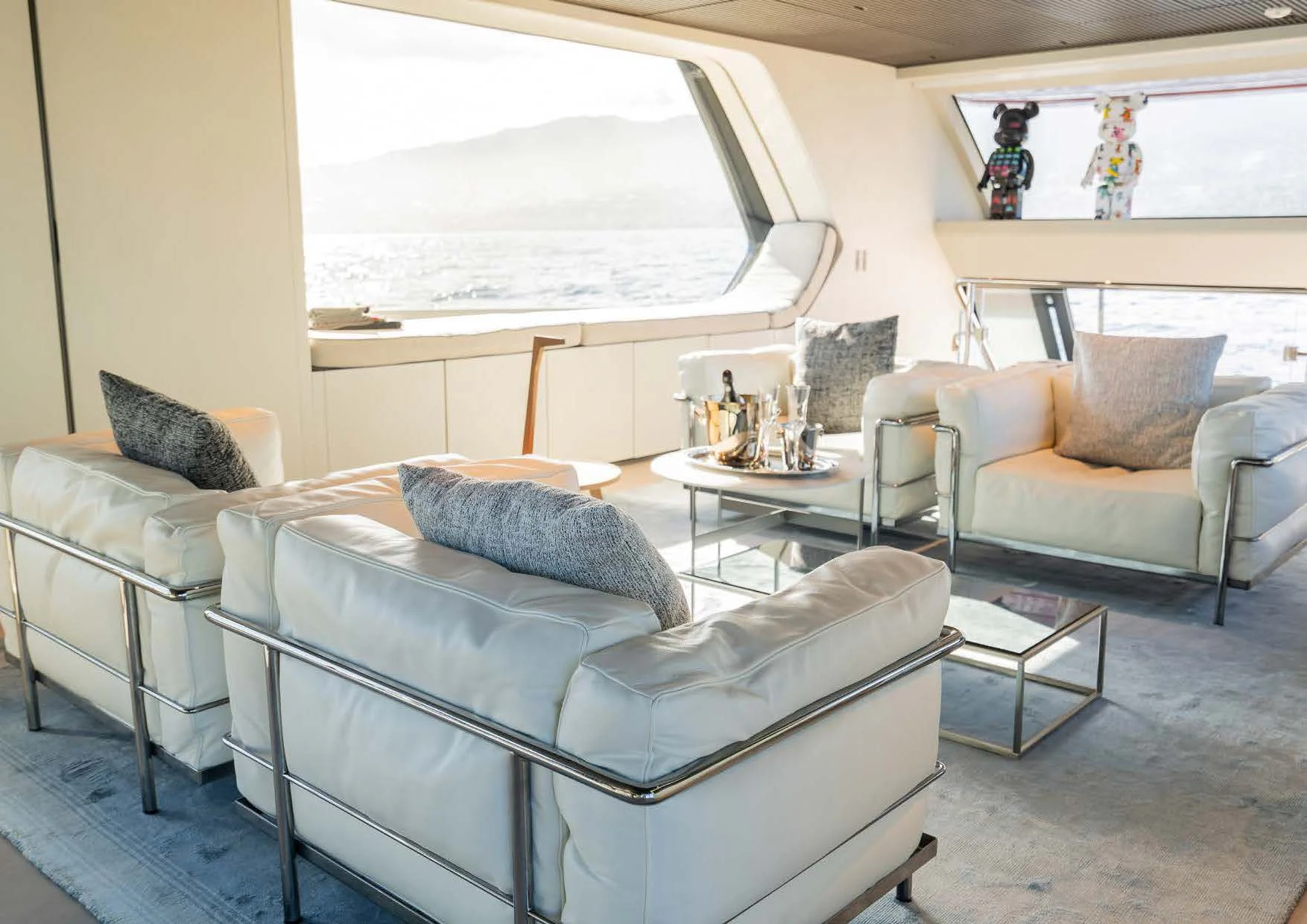 a living room with a couch and a table aboard ANMAX Yacht for Sale