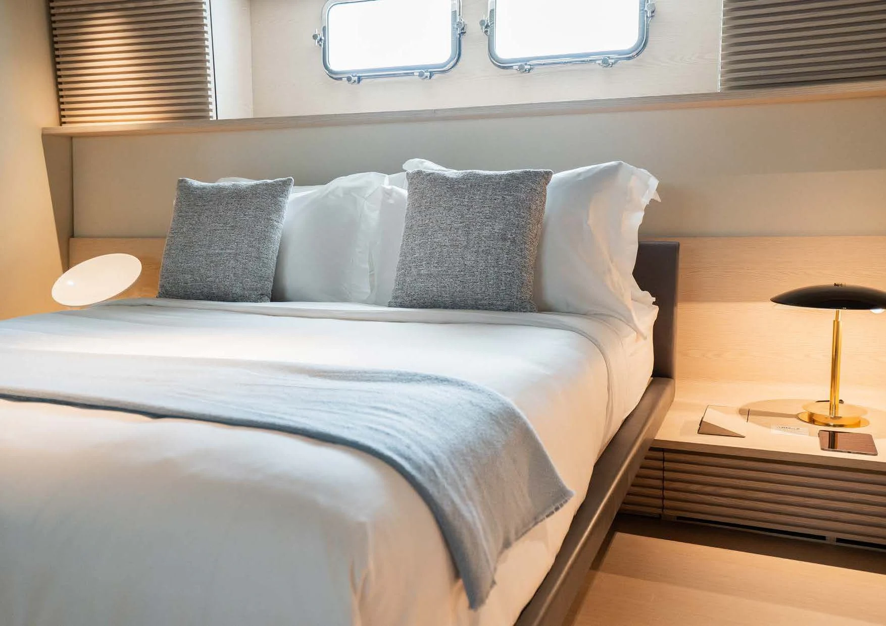 a bed with pillows aboard ANMAX Yacht for Sale