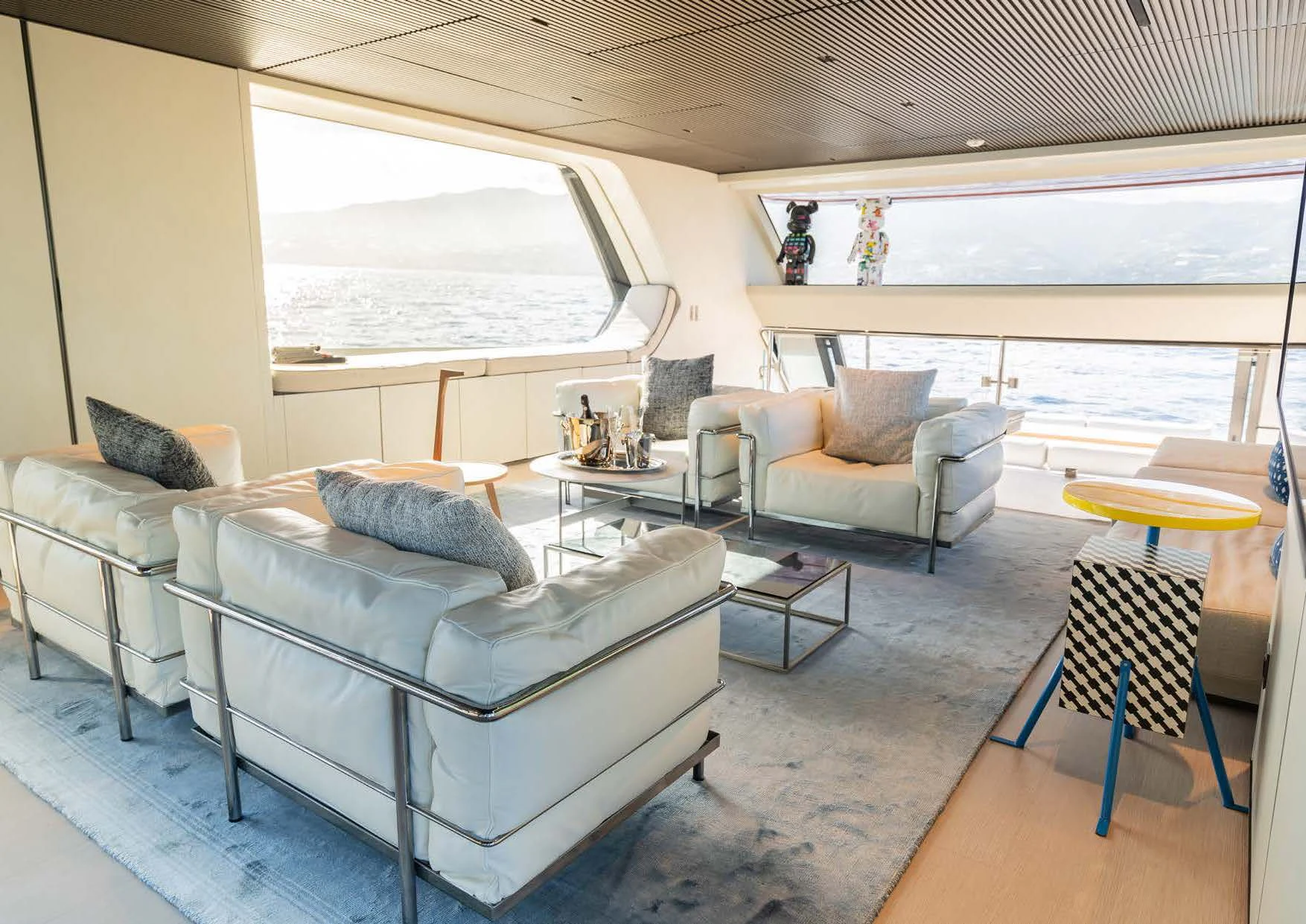 a living room with a couch and a table aboard ANMAX Yacht for Sale