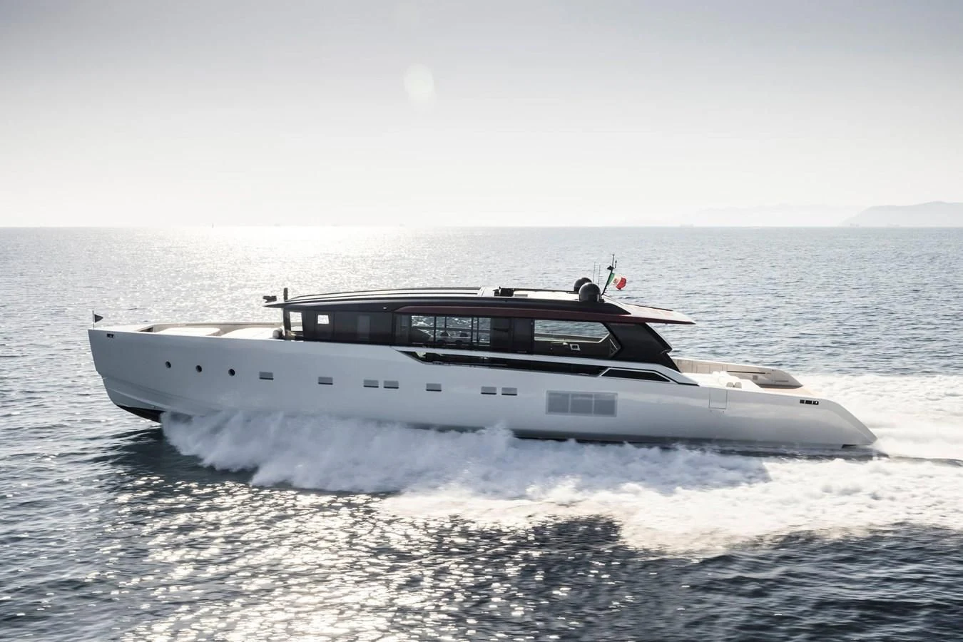 a white yacht in the water aboard ANMAX Yacht for Sale