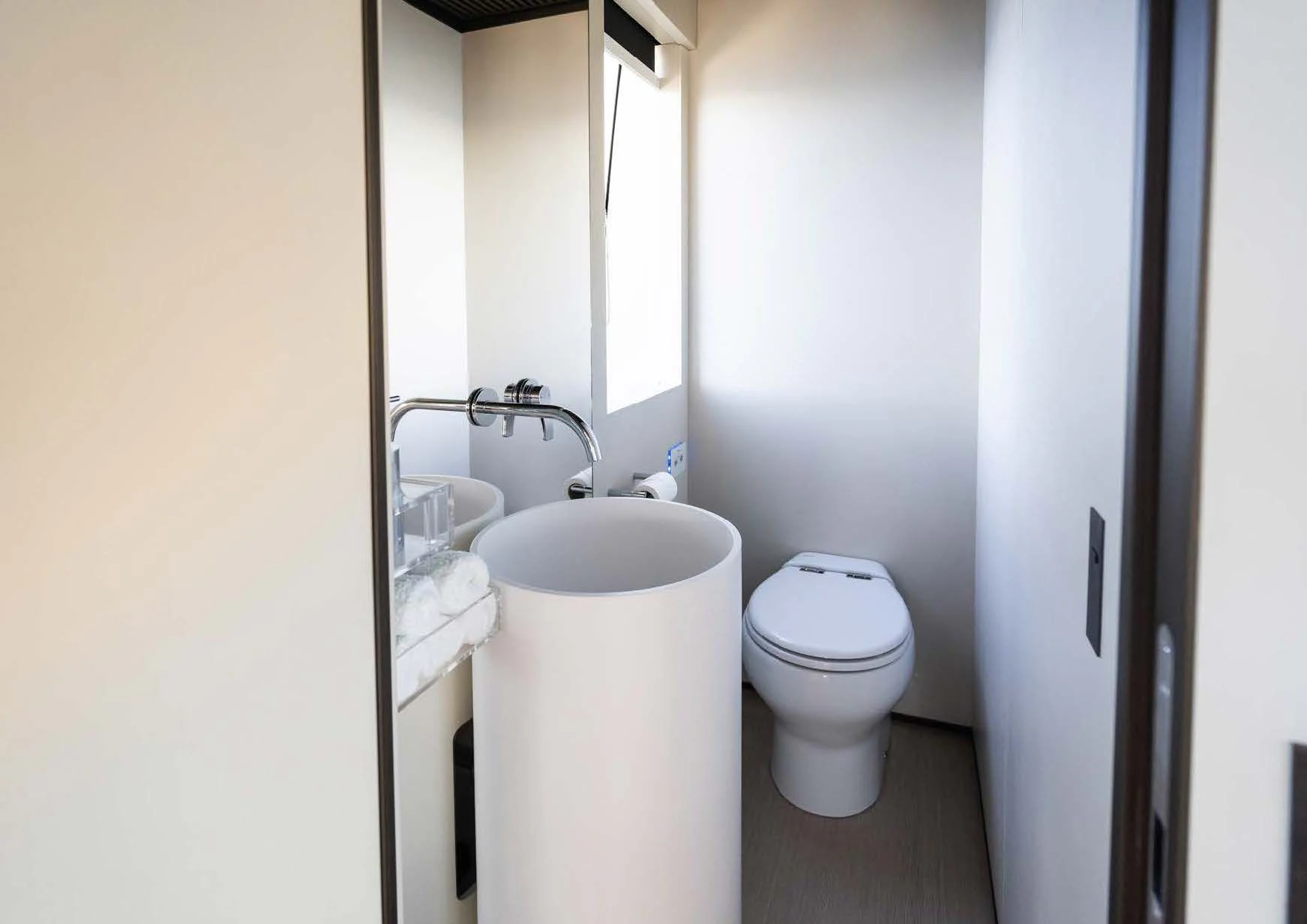a bathroom with a sink toilet and a bathtub aboard ANMAX Yacht for Sale