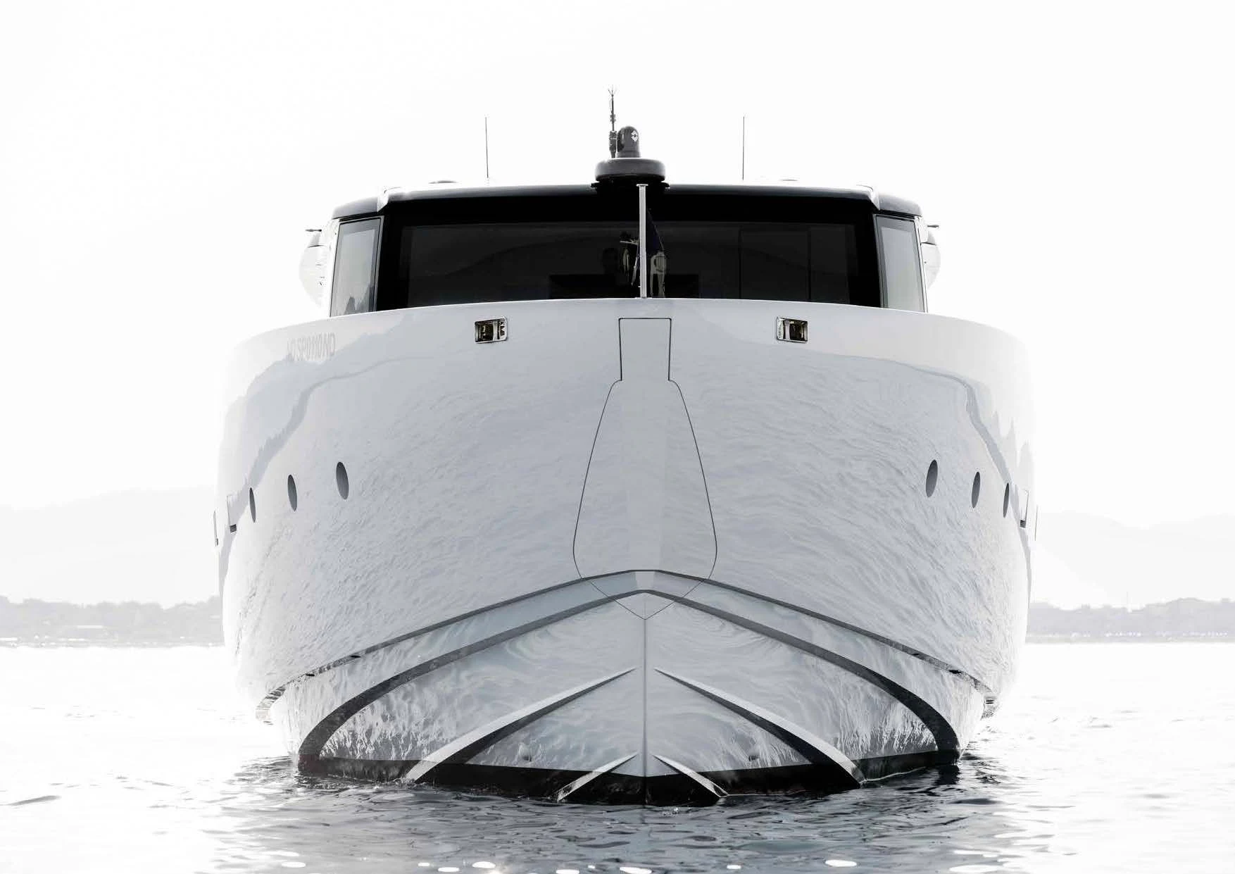 a white boat in the water aboard ANMAX Yacht for Sale