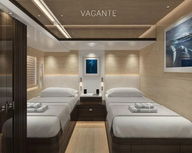 a room with a bed and a couch aboard VAGANTE Yacht for Sale