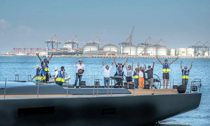 a group of people on a boat aboard NYUMBA GT Yacht for Sale