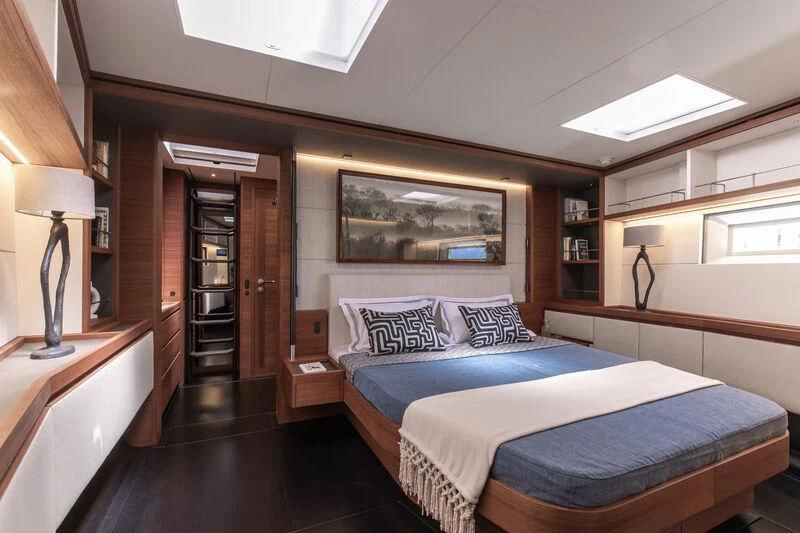 a room with two beds aboard NYUMBA GT Yacht for Sale