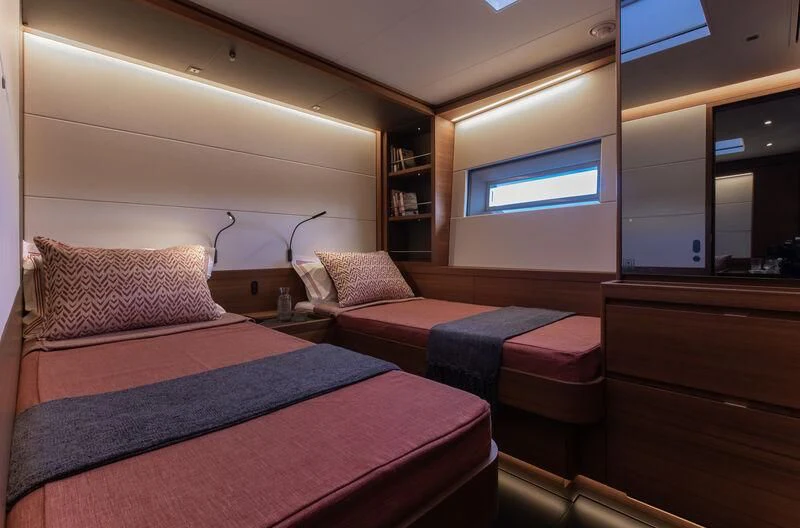 a room with two beds aboard NYUMBA GT Yacht for Sale