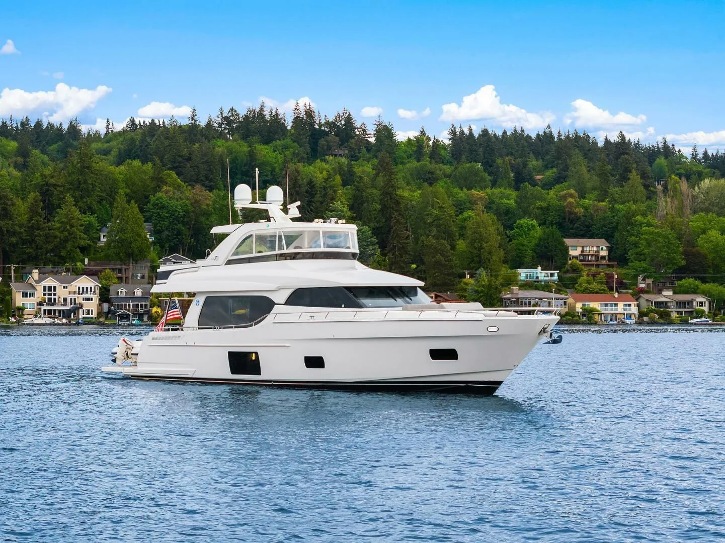 a white yacht in the water aboard PLAYBOOK Yacht for Sale