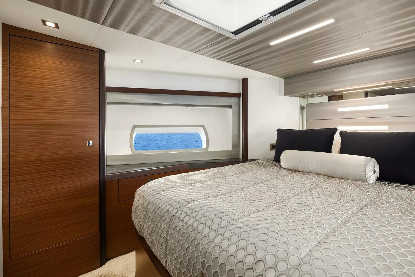 a bed in a room aboard PLAYBOOK Yacht for Sale