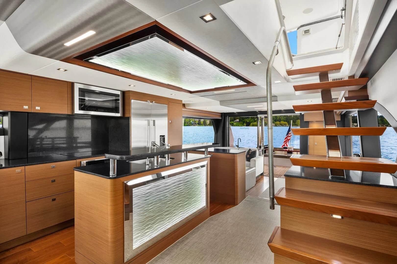 a modern looking kitchen aboard PLAYBOOK Yacht for Sale