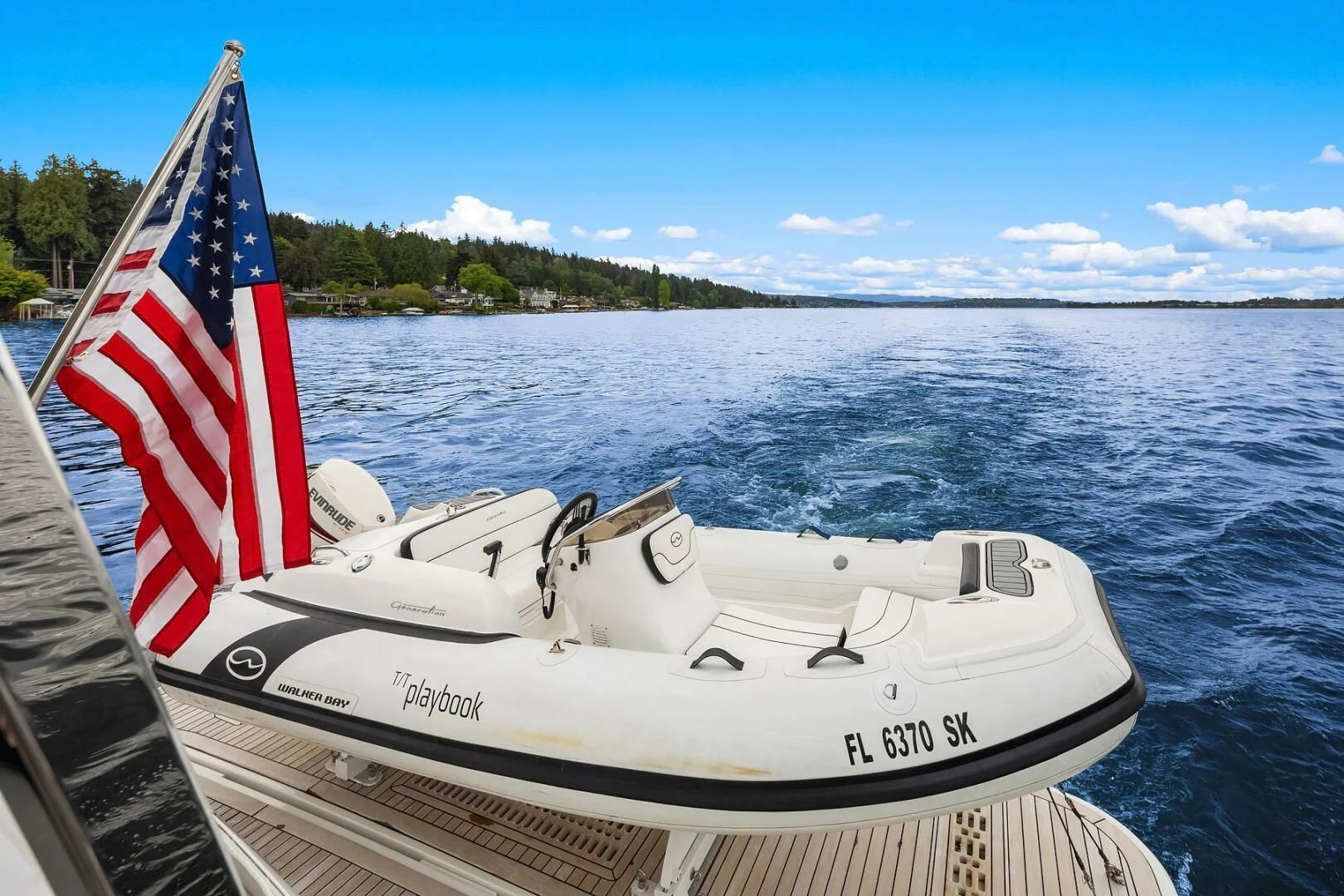a boat on the water aboard PLAYBOOK Yacht for Sale