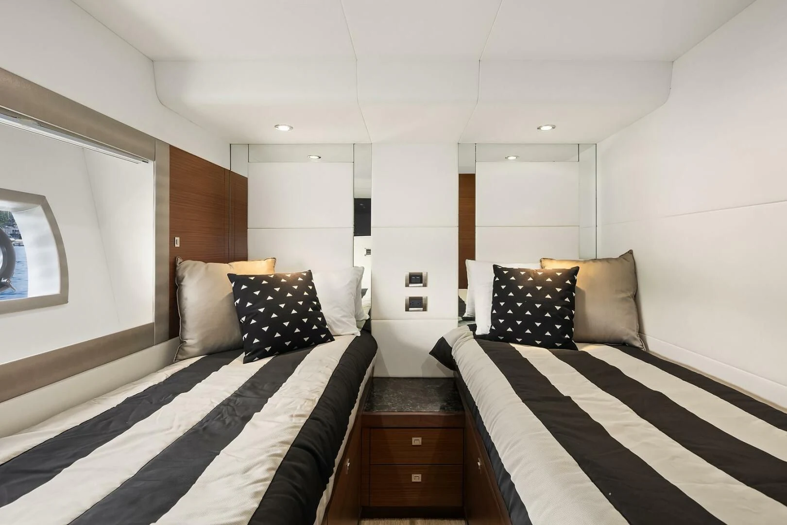 a couple of beds in a room aboard PLAYBOOK Yacht for Sale
