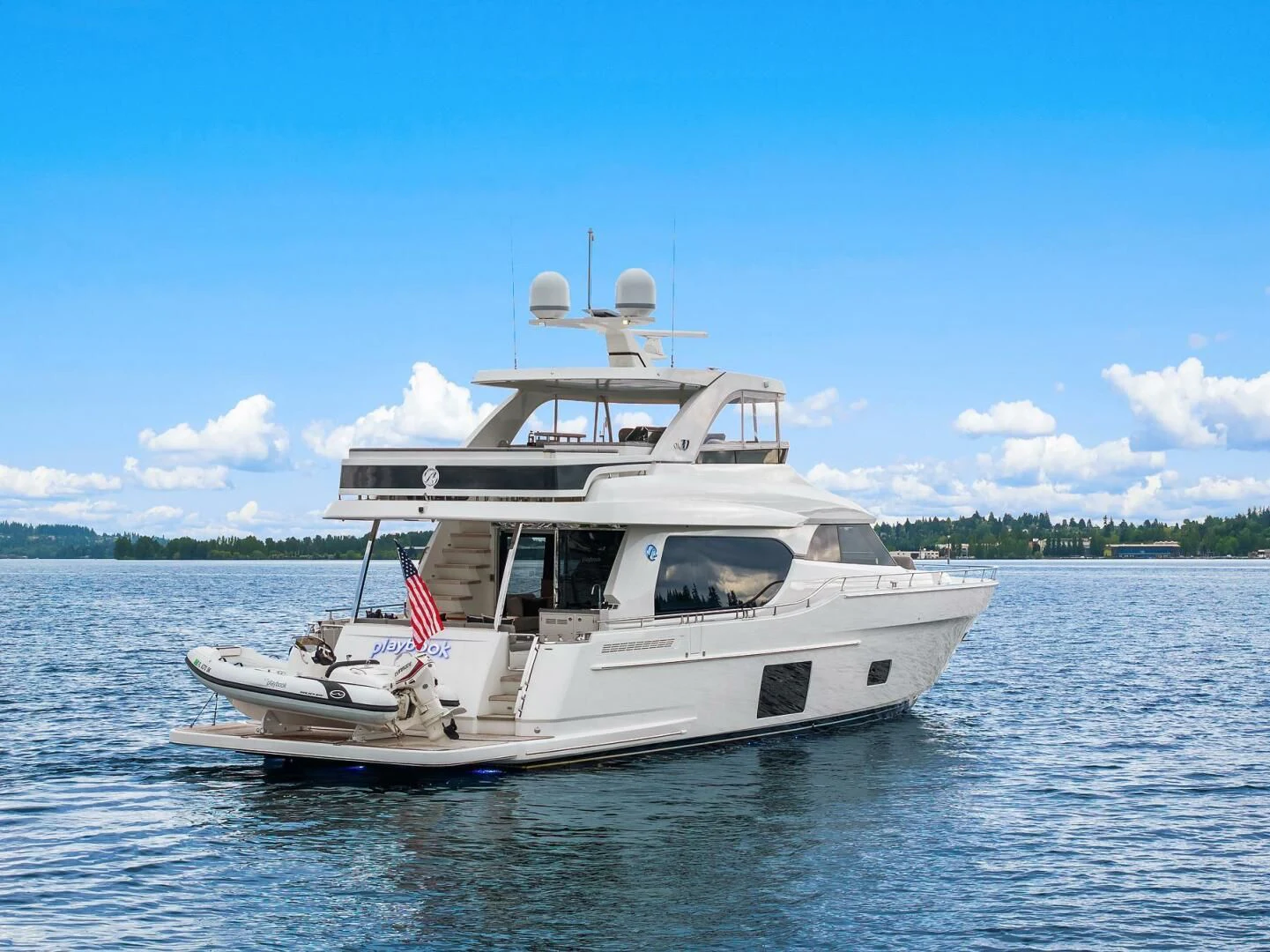 a boat on the water aboard PLAYBOOK Yacht for Sale