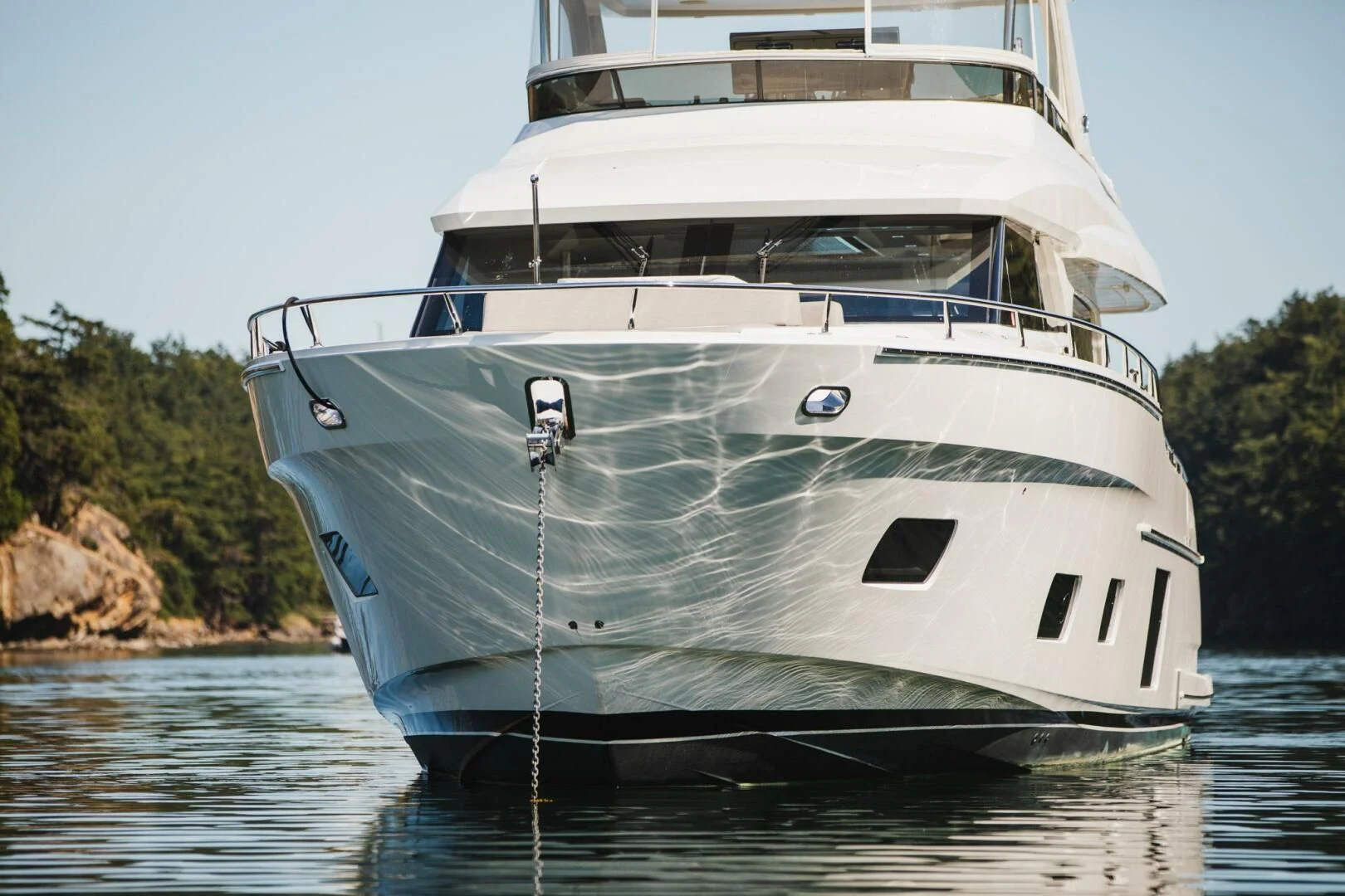 a white yacht on the water aboard PLAYBOOK Yacht for Sale