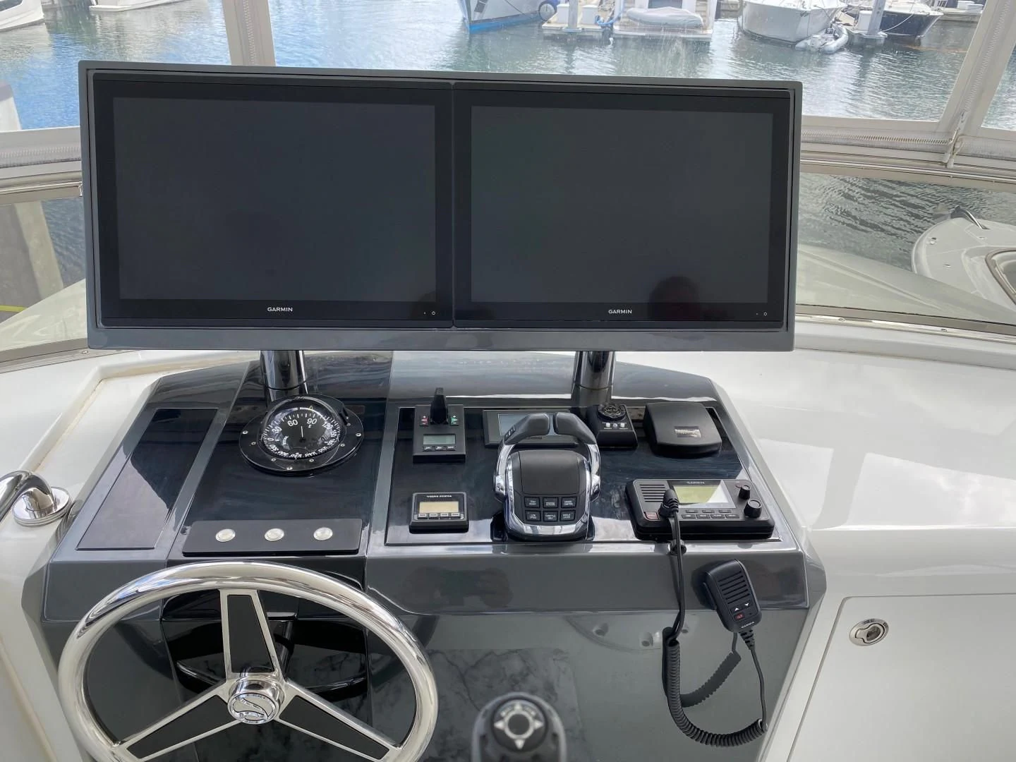 a computer with a screen and other electronic devices on it aboard PLAYBOOK Yacht for Sale
