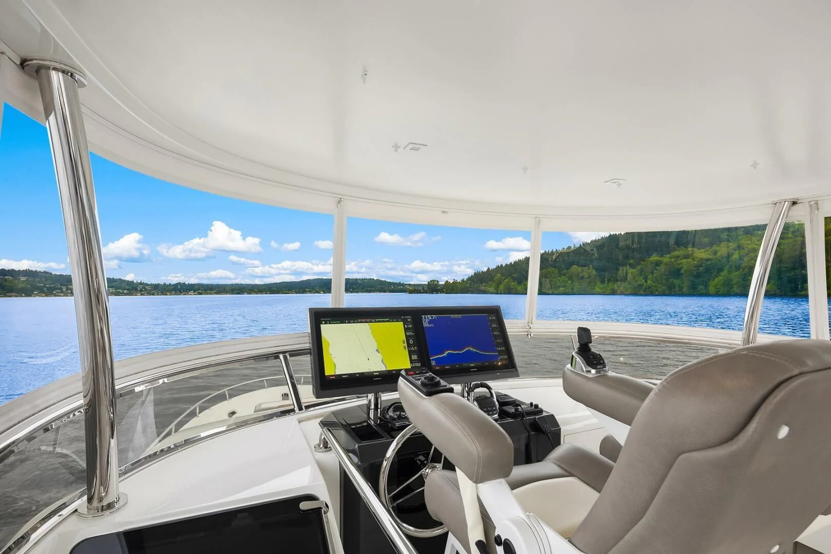 a boat with a computer monitor and a laptop on it aboard PLAYBOOK Yacht for Sale